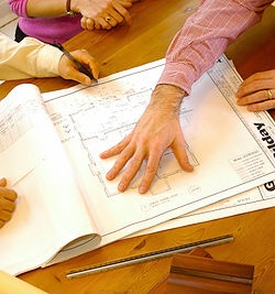 Gilday Renovations Architect discuss plans with clients