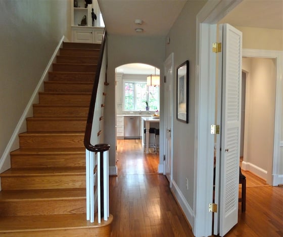 center hall looks through new kitchen addition to yard beyond