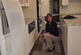 Kitchen designer Ellen Gilday Witts finalizes details at kitchen remodeling project in McLean Virginia