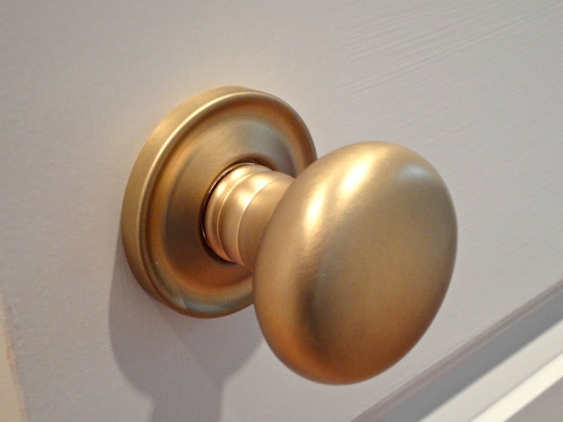 detail of brushed brass door knob