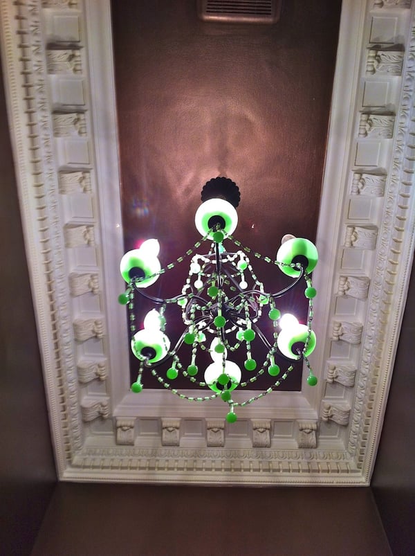 ornate ceiling in small bathroom