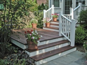 AFTER RENOVATION A TERRACED WALKWAY TO THE PATIO AND YARD